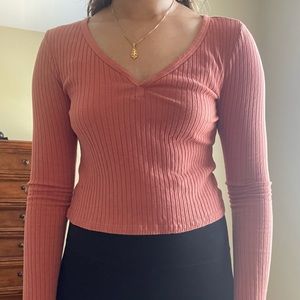 salmon orange long sleeve top